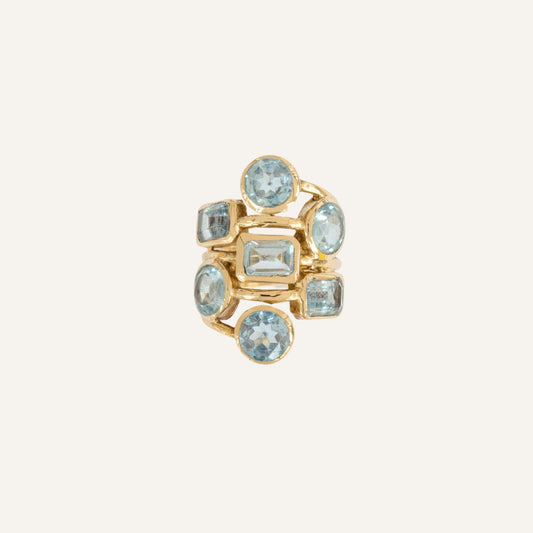 Bague dorée à l'or fin et pierres Topaze bleue - Louisa